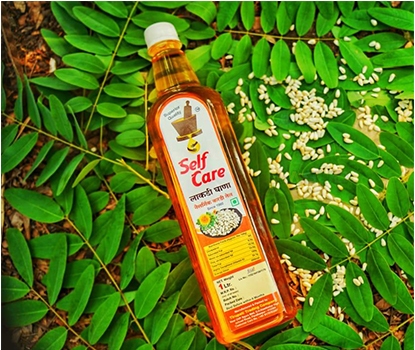 Selfcare wooden pressed kardai oil चे चित्र