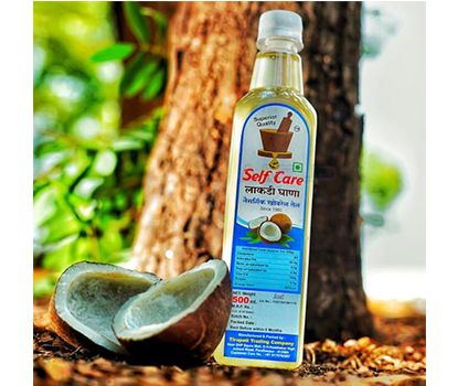 Selfcare wooden pressed coconut oil की तस्वीर